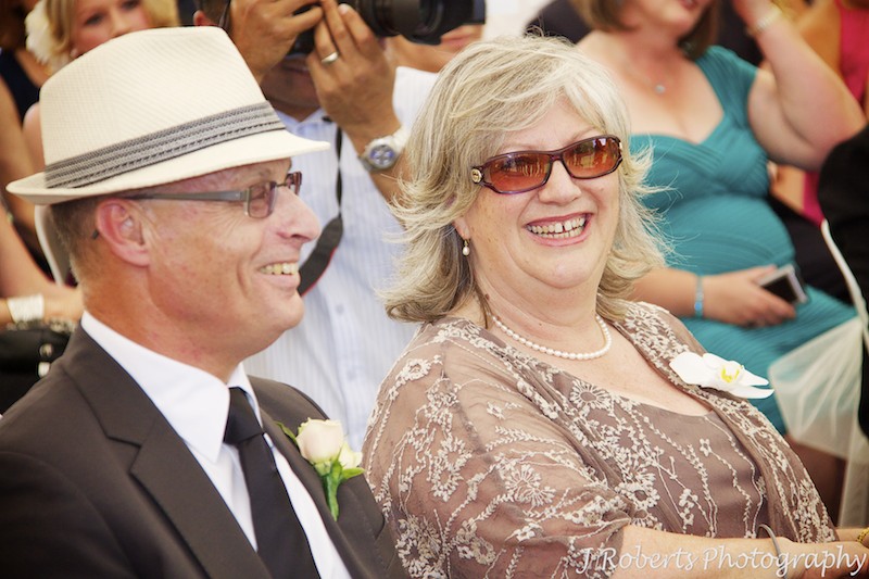 Parents of groom enjoying wedding ceremony - wedding photography sydney